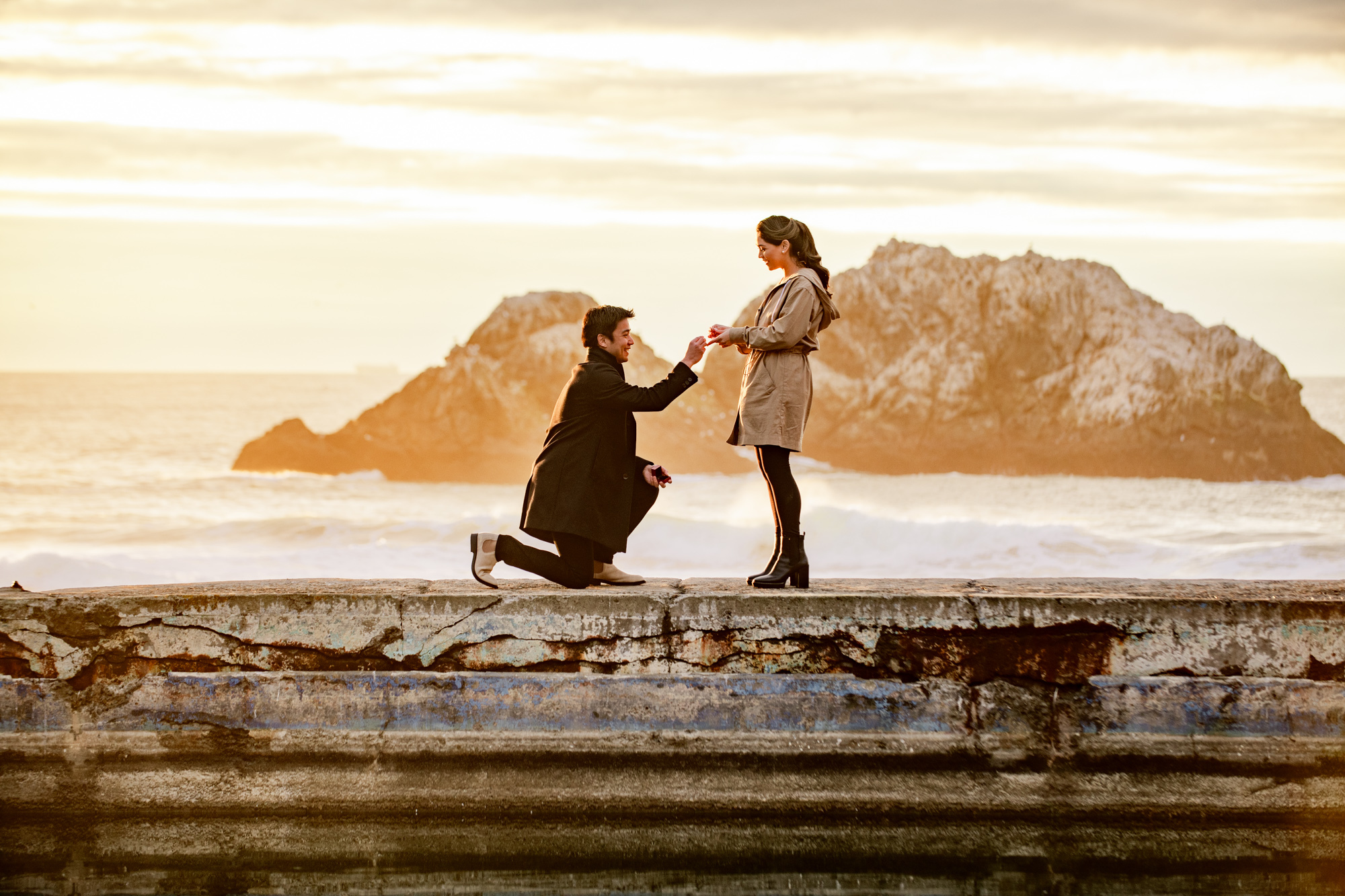 San Francisco proposal photography with a couple embracing in a scenic outdoor location